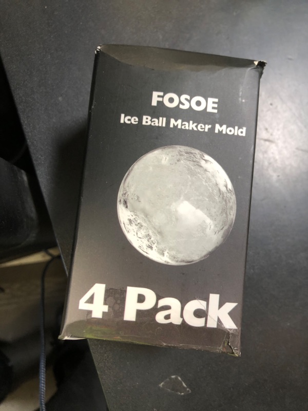 Photo 1 of Silicone Ice Ball Molds for Whiskey - Set of 4 Round Makers with Lids for Cocktails, Bourbon, and Drinks