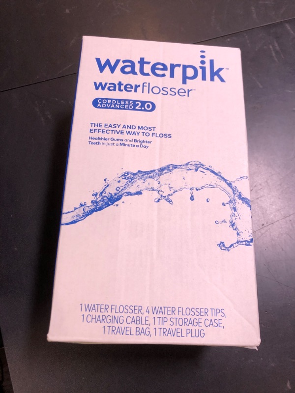 Photo 1 of Waterpik Cordless Advanced 2.0 Water Flosser For Teeth, Gums, Braces, Dental Care With Travel Bag and 4 Tips, ADA Accepted, Rechargeable, Portable, and Waterproof, White WP-580, Packaging May Vary