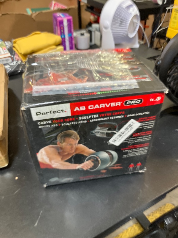 Photo 1 of Perfect Fitness Ab Carver Pro Roller Wheel With Built In Spring Resistance, At Home Core Workout Equipment, Red