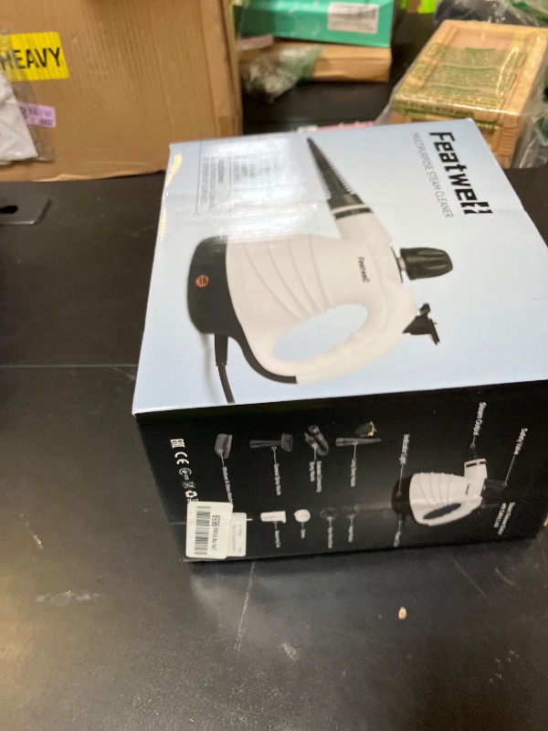 Photo 1 of Featwell Handheld Steam Cleaner, Pressurized Portable Multi-Surface Steam Cleaner with 12 pcs Accessories, Multi-Purpose Portable Steamer for Cleaning Dirt, Grease, Tile, Floor, Couch, Car