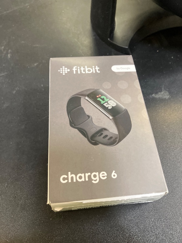Photo 1 of Fitbit Charge 6 Fitness Tracker with Google apps, Heart Rate on Exercise Equipment, 6-Months Premium Membership Included, GPS, Health Tools and More, Obsidian/Black, One Size (S & L Bands Included)