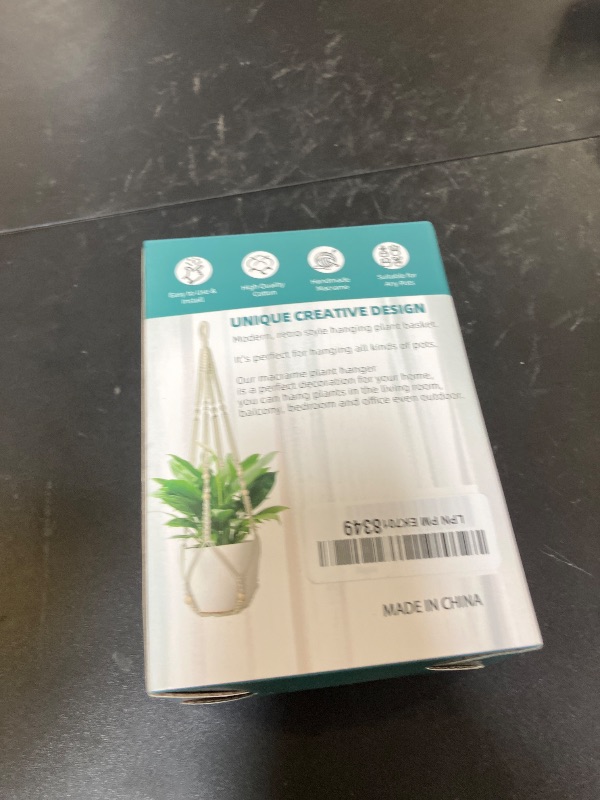 Photo 1 of EWPJDK 3 PCS Macrame Plant Hanger Indoor Hanging Planter Basket with Wood Beads Plants Holder Decorative Flower Pot Holder (POTS NOT Included) (Ivory White)