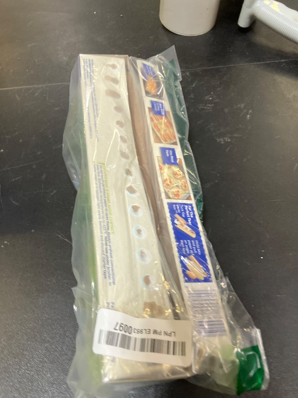 Photo 1 of Reynolds Kitchens Unbleached Parchment Paper Roll, Non Stick Parchment Paper for Cooking and Baking, Oven Safe up to 425 Degrees, Chlorine-Free, 45 Feet x 12 Inches, 45 Total Sq. Ft.