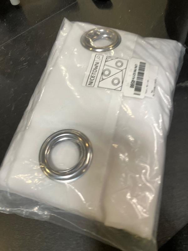 Photo 1 of NICETOWN White Sheer Curtains 84 inches Long - Home Decoration Grommet Airy & Lightweight Elegant Window Treatments with Light Filtering for Bedroom/Living Room (2 Panels, W54 x L84)