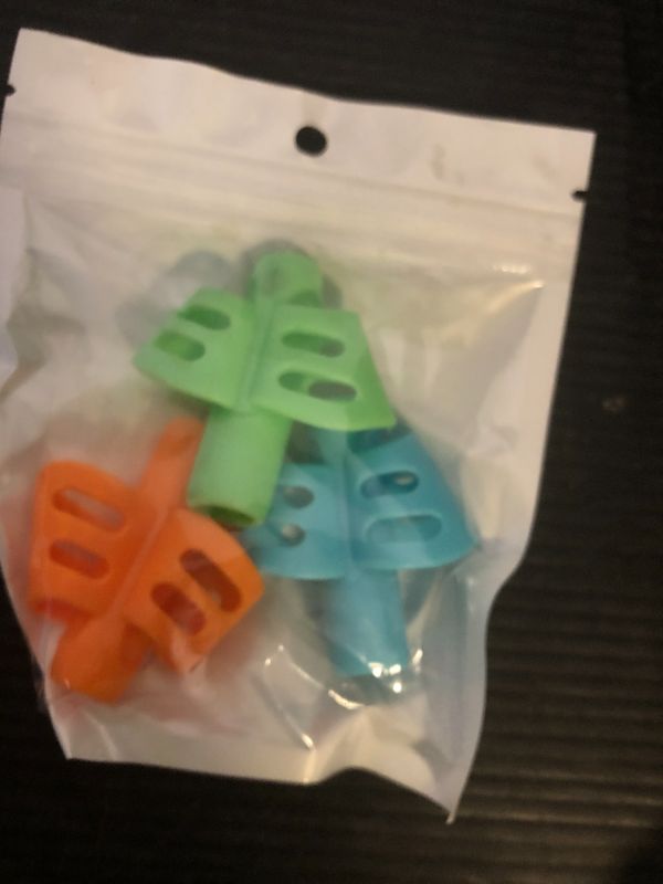Photo 1 of JuneLsy Pencil Grips for Kids Handwriting Pencil gripper Pencil Holder Posture Correction Training Writing AIDS for preschooler Kids toddler Children Special Needs (3 PCS)