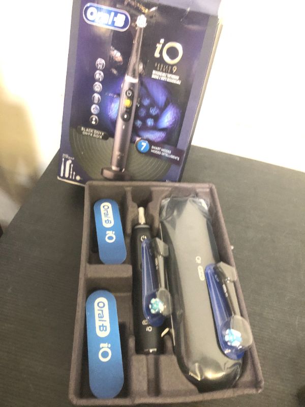 Photo 1 of Oral-B iO Series 9 Electric Toothbrush with 3 Replacement Brush Heads, Black Onyx