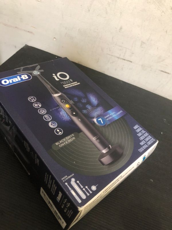 Photo 1 of Oral-B iO Series 9 Electric Toothbrush with 3 Replacement Brush Heads, Black Onyx