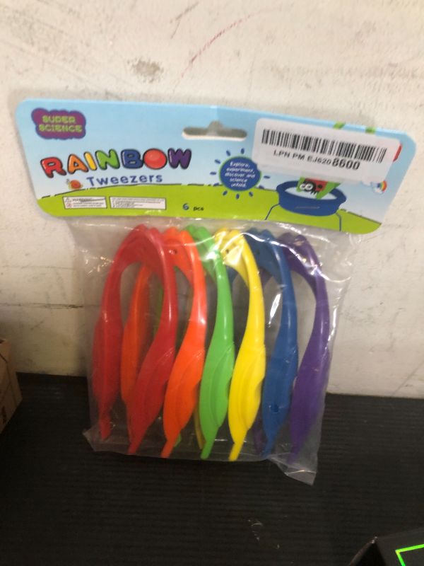 Photo 1 of MOLIMOLLY 6Pcs Plastic Colorful Easy Grip Rainbow Tweezers, Easy Grasp Science Lab Tools Accessories for Kids
