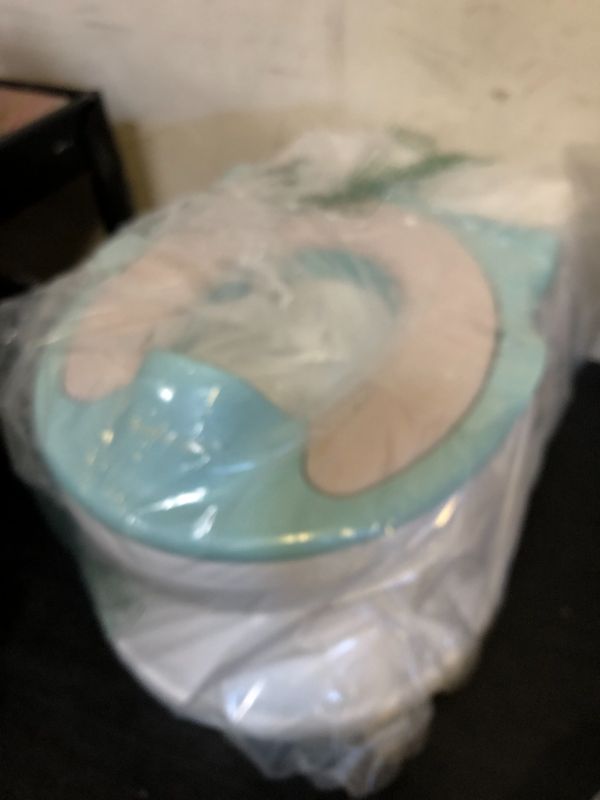Photo 1 of Real Feel 2-in-1 Potty with Wipes Storage, Flushing Sounds & Disposable Liners - Realistic Toilet - Easy to Clean & Assemble - Jool Baby (Aqua)