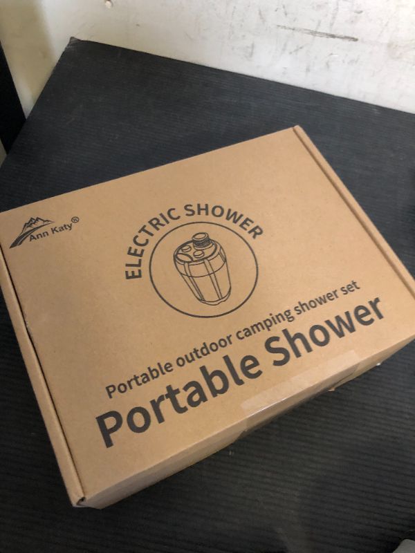 Photo 1 of Ann Katy Portable Camping Shower Outdoor Camp Shower Pump,Upgrade Rechargeable Electric Shower Pump with Intelligent Digital Display Multiple Spray Modes for Camping, Hiking, Traveling,RV