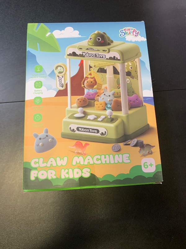 Photo 1 of Skirfy Dinosaur Claw Machines,Electronic Arcade Game Vending Machine with Adjustable Sound& 32Pcs Mini Prizes,Candy Grabber Prize Dispenser Toys for Boys Girls,Birthday Toy Gifts for Kids