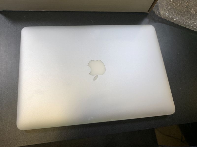 Photo 1 of Apple MacBook Pro 256GB Wi-Fi Laptop 13.3in with Intel Core i5 MF840LL/A - Silver (Renewed)