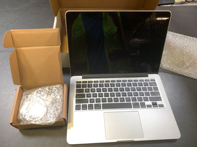 Photo 1 of Apple MacBook Pro 256GB Wi-Fi Laptop 13.3in with Intel Core i5 MF840LL/A - Silver (Renewed)