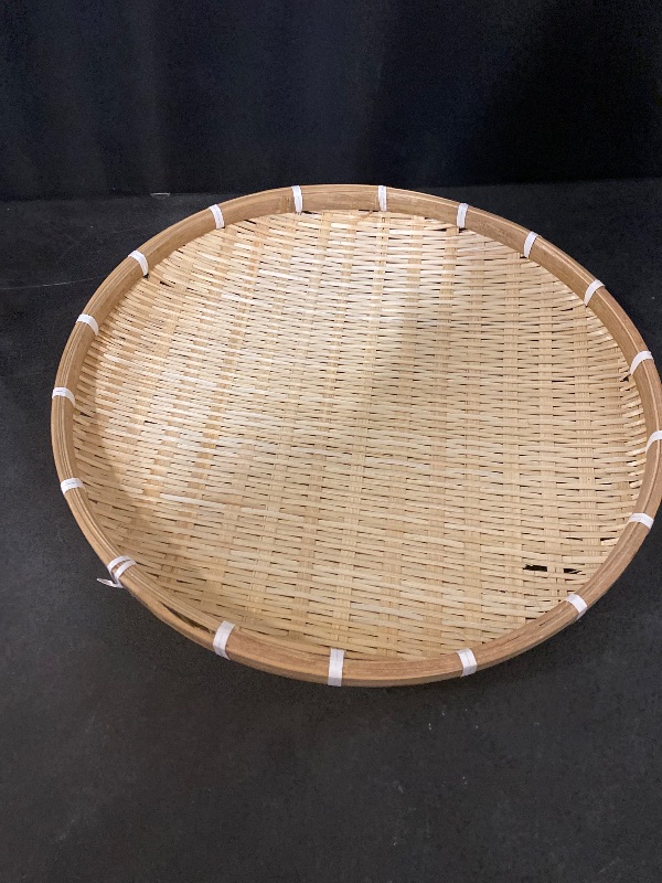 Photo 1 of Bamboo Woven Tray 16.5 Inch Round Flat Bamboo Basket Handmade No Hole Sieve Multipurpose Serving Tray for Home Kitchen Farmhouse