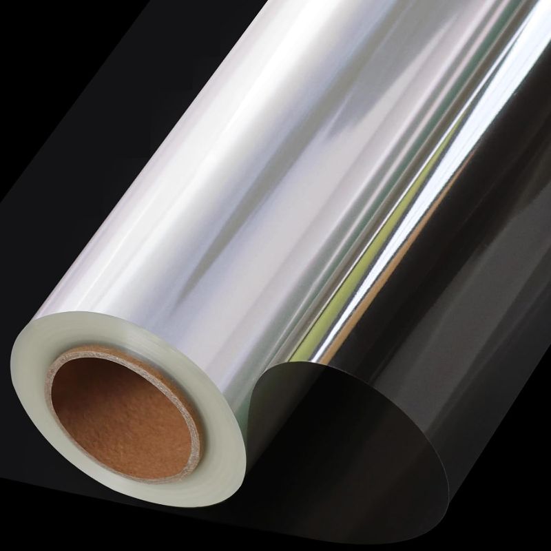 Photo 1 of 100 ft Extra Wide Clear Cellophane Wrap Roll, 54" x 100', Thicker Transparent Paper for Gifts, Treats, Holidays, Christmas