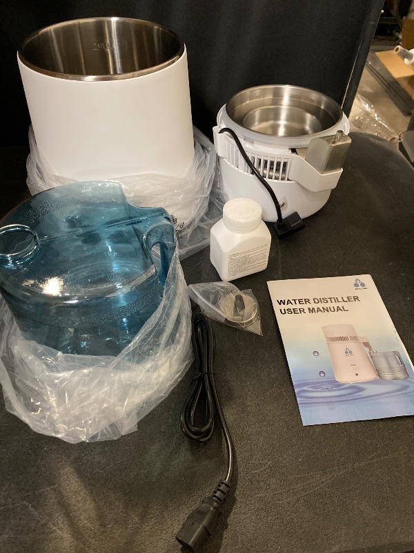 Photo 1 of DC HOUSE 1 Gallon Water Distiller Machine, 750W 4L Pure Distilled Water Maker Machine for Home Countertop Table Desktop, Drinking Purifier for Home Kitchen CPAP Hmidifiers with Pastic Container