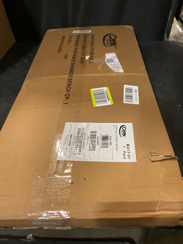 Photo 1 of Carex Portable Shower Bench - Shower Bath Seat - Fits tub having width in the range of 19"-28". Comfortable Contoured Seating Area with 300 Pound Weight Capacity, Portable and Easy to Store