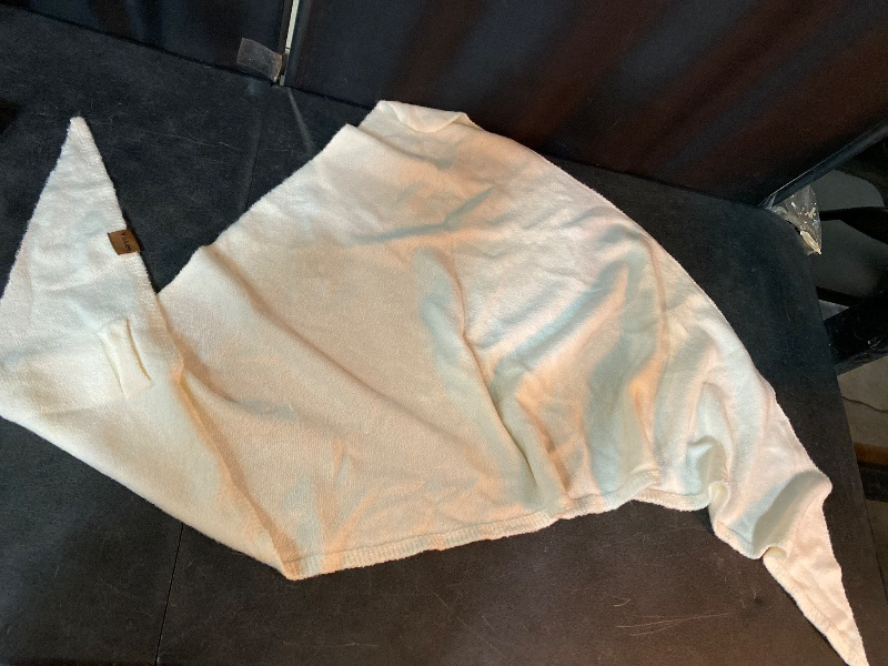 Photo 1 of Fleece Triangle Couch Blanket