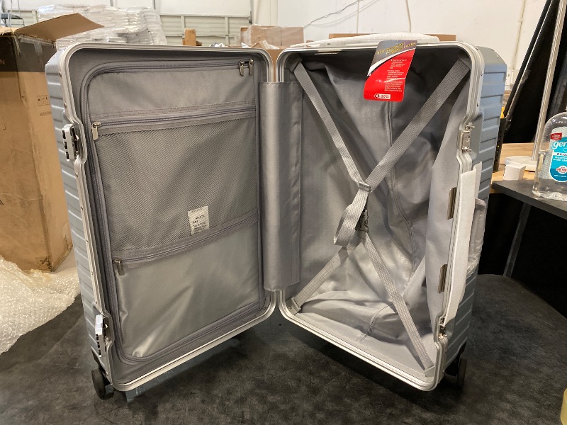 Photo 1 of LUGGEX Checked Suitcase with Spinner Wheels, 8010S Aluminum Frame Zipperless Polycarbonate Hard Shell Suitcase (ZX-Core, Silver, 26 Inch)
