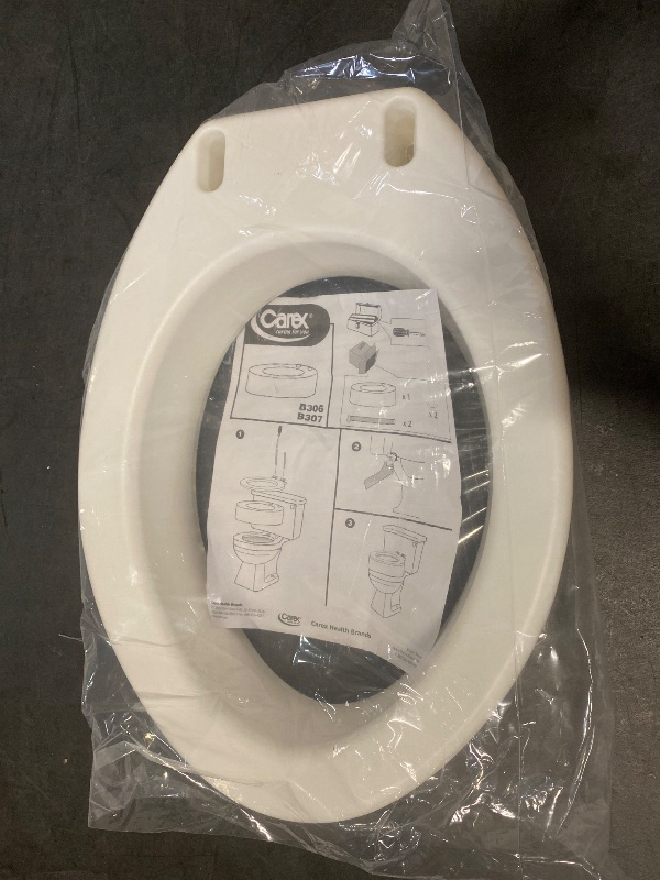 Photo 1 of Carex Toilet Seat Riser, Elongated Raised Toilet Seat Adds 3.5 inches to Toilet Height, for Assistance Bending or Sitting, 300 Pound Weight Capacity Toilet Riser