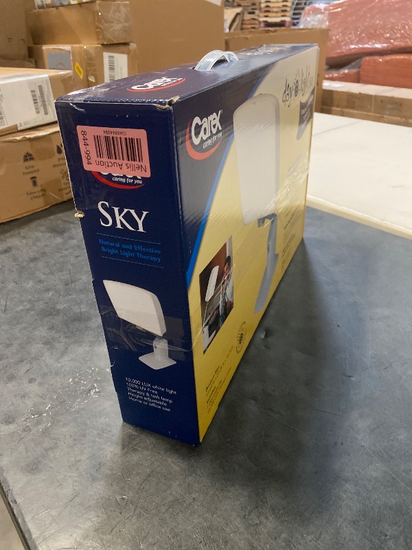 Photo 1 of Carex Day-Light Sky Bright Sunlight Therapy Lamp, 10000 LUX Therapy Lamp at 12 Inches, LED Bright White Light with Adjustable Height and Brightness Levels for Mood, White