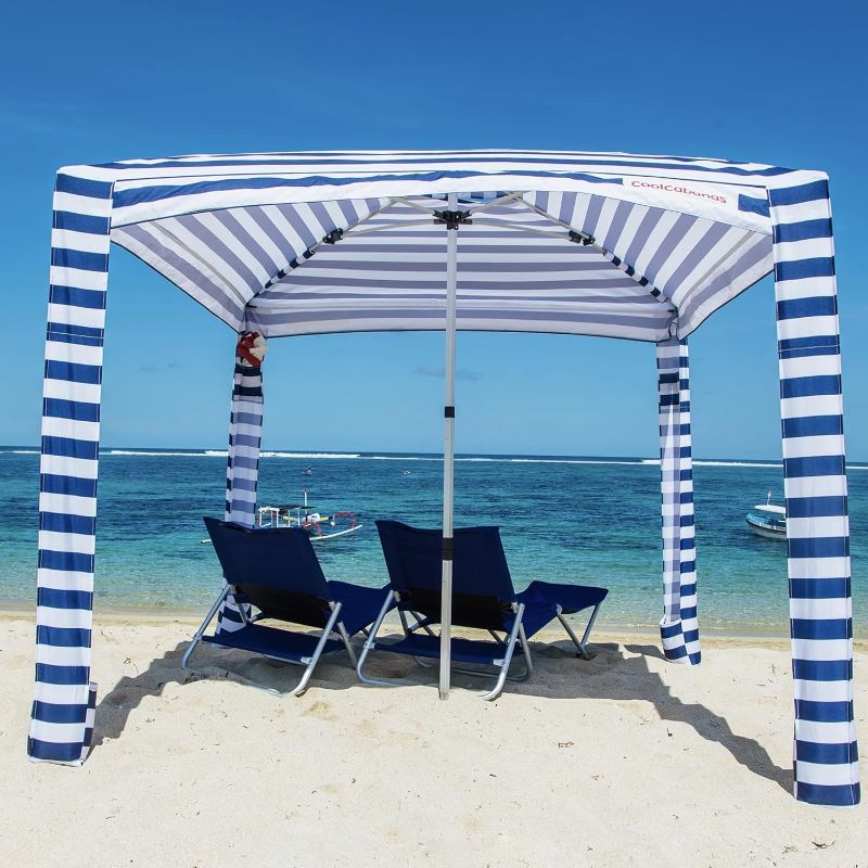 Photo 1 of CoolCabana Beach Shade Tent - Easy Setup, UPF 50+ Protection, Large & Medium Sizes, Compact & Wind Resistant - Beach Cabana for The Whole Family - Navy Stripes, Medium
