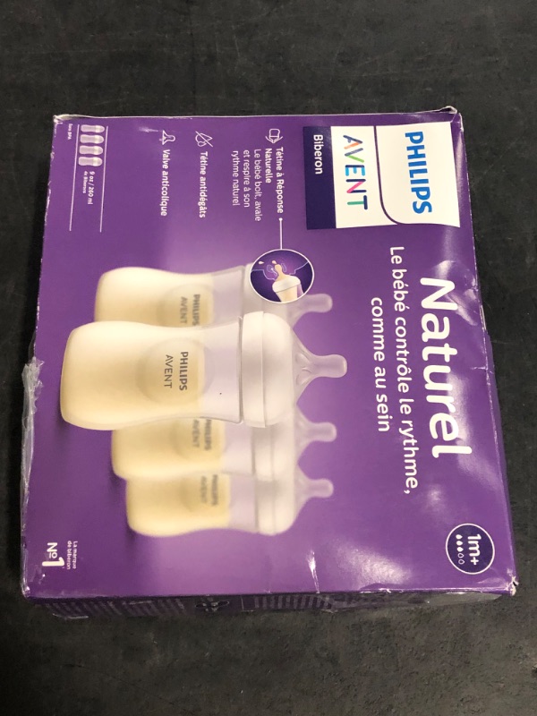 Photo 1 of Philips Avent Natural Baby Bottles with Natural Response Nipples (Medium Flow, Flow 3), 9oz, 4-Pack, SCY903/04
