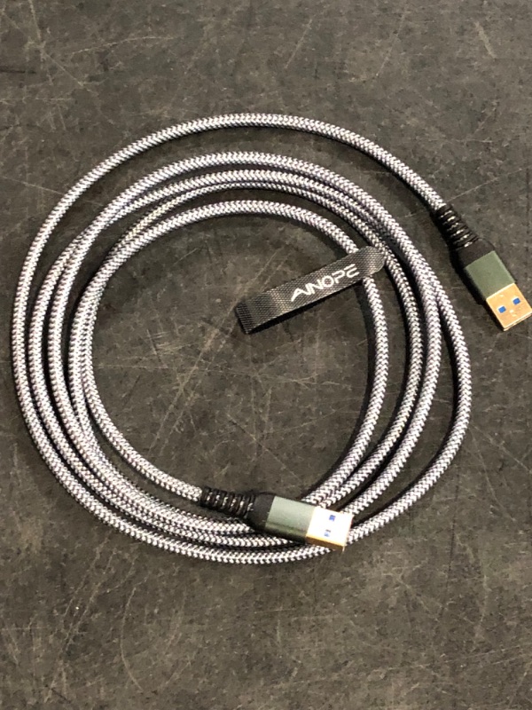 Photo 1 of AINOPE USB to USB Cable, USB 3.0 A to A Male to Male Cable [Never Rupture] Double End Type A Cord Compatible with Hard Drive Enclosures, KVM, DVD Player, TV, Laptop Cooler,10Ft/Grey

