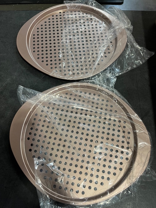 Photo 1 of Pizza Pan Set, Nonstick Pizza Pan with Holes 13 Inch, Heavy Duty Round Perforated Pizza Tray Oven Safe, Even Heat for Crispy Homemade Pizza, Easy to Clean, Set of 2, Gold

