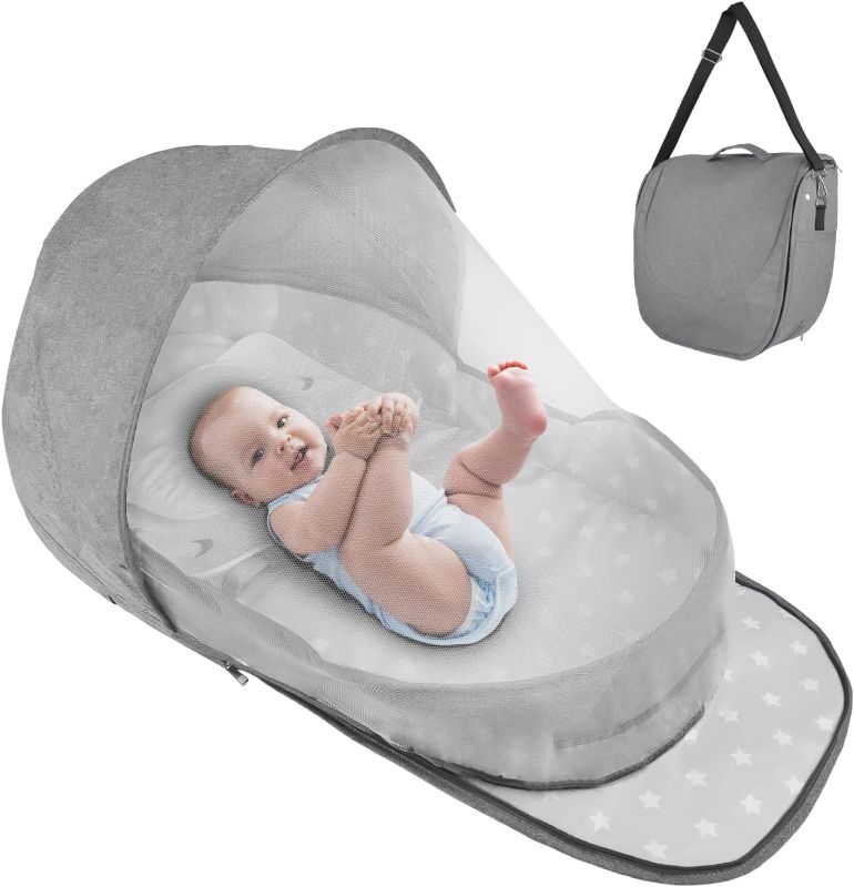 Photo 1 of Portable Bassinet for Baby Travel & Home - Lightweight Foldable Bedside Sleeper with Breathable Mesh, Carry Bag & Storage Pocket, Compact Bassinets for Newborn Infant, Safe Cosleeping Design
