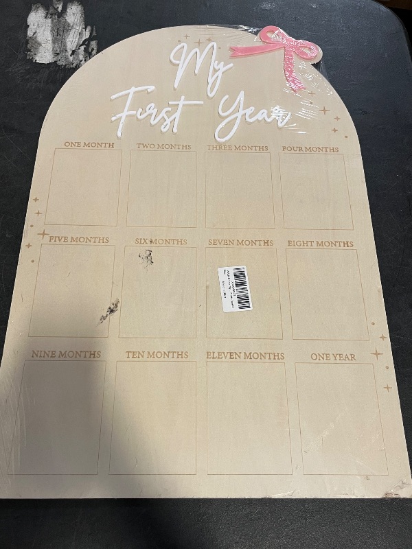 Photo 1 of WAUAO Bow My First Year Birthday Board - One Year Of Photo Board,Monthly Milestone Wood Photo Board,First Birthday Decorations Girl,12 Months Photo Banner
