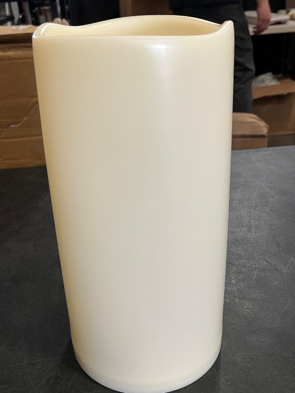 Photo 1 of iZAN Outdoor LED Flameless Candle with Timing Function Waterproof Plastic Realistic Flickering Battery Operated LED Pillar Candle Long Lasting Battery Life 3x6 inch Waved Edge
