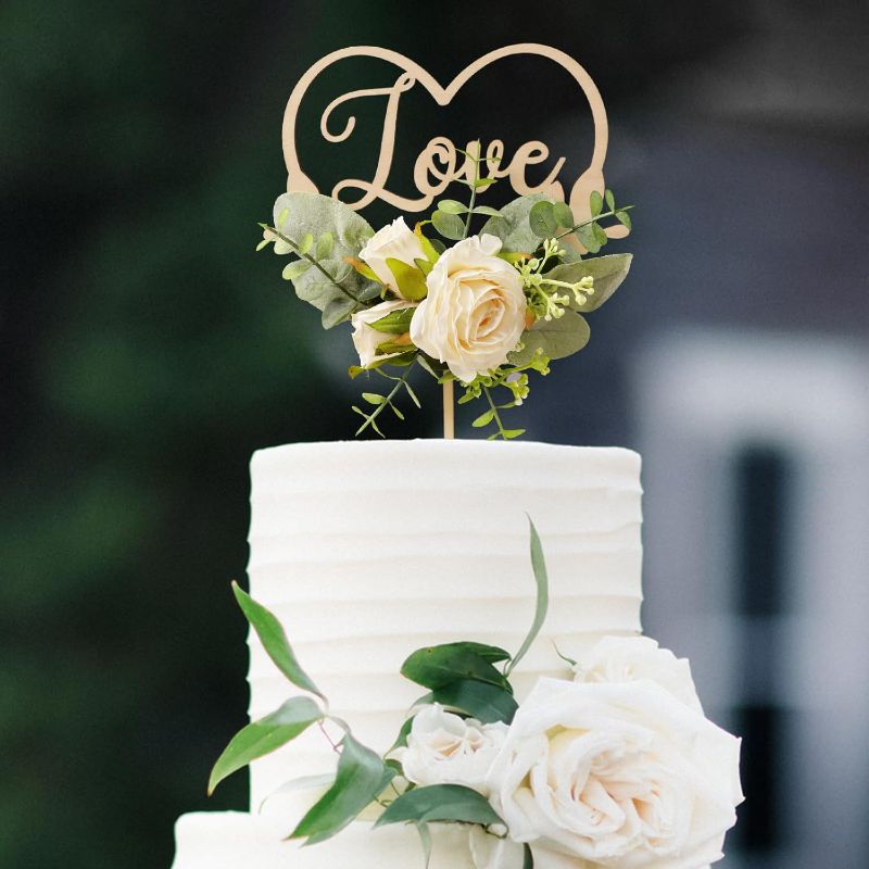 Photo 1 of Love Wedding Cake Topper in Wood Heart Cake Topper with Flowers and Leaves
