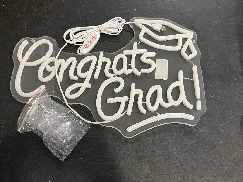 Photo 1 of Congrats Grad Neon Sign with Graduation Cap, 16 * 11 Inch Warm White Grad Light Up Sign for Wall Decor, Adjustable Congrats Led Sign for Class of 2025 Party Room Dorm Backdrop Celebration Gifts
