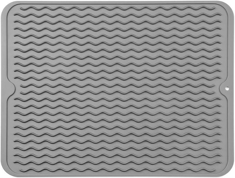 Photo 1 of Silicone Dish Drying Mat for Multiple Usage,Easy clean,Eco-friendly,Heat-resistant Silicone Mat for Kitchen Counter or Sink,Refrigerator or drawer liner Grey L 16 inches x 12 inches
