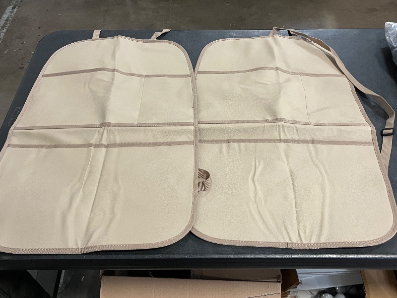 Photo 1 of Kick Mat Back Seat Protector Waterproof Leather Car Seat Back Organizers Cover with 3 Storage Pockets for Kids Pets SUV Sedan Minivan Truck Car Travel Accessories (Beige 2-Pack)
