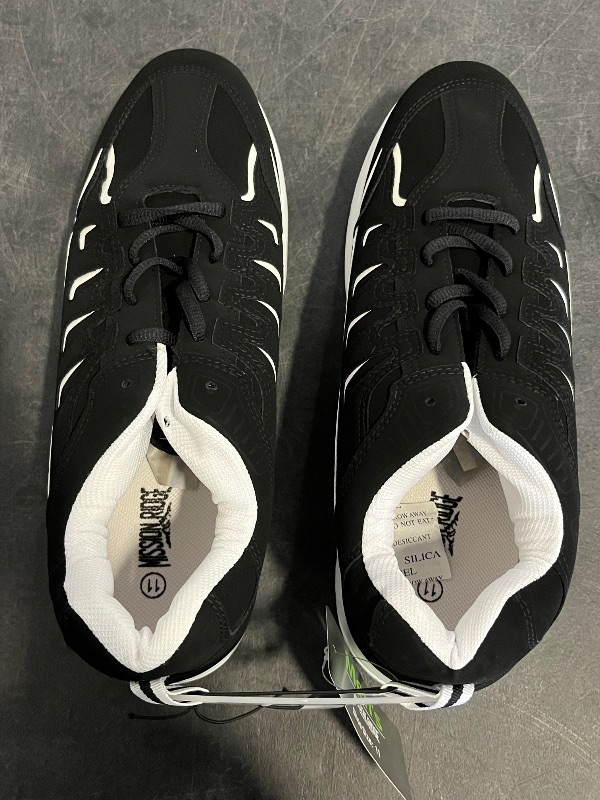 Photo 1 of Size 11 Mens Black and White Sneakers