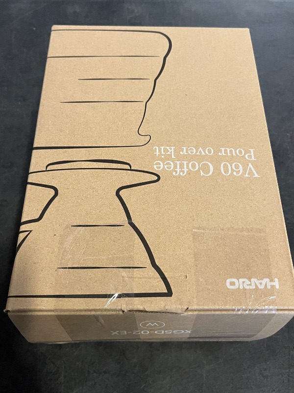 Photo 1 of Hario V60 Coffee Pour Over Kit Bundle Set - Comes with Ceramic Dripper, Range Server Glass Pot, Measuring Spoon, and 100 Count Package of Hario 02W Coffee Filters
