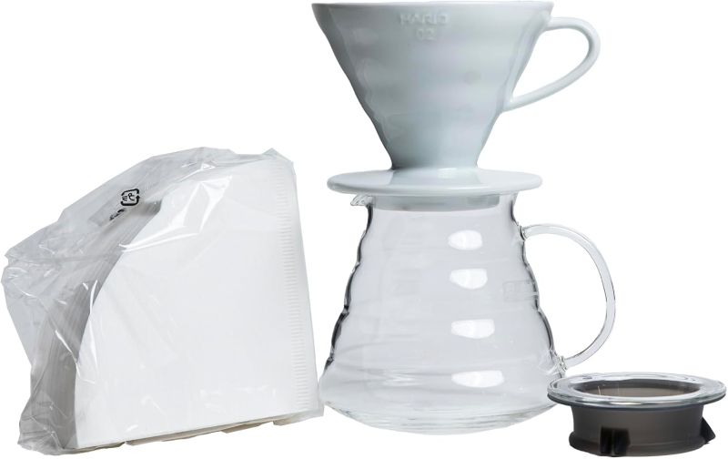 Photo 1 of Hario V60 Coffee Pour Over Kit Bundle Set - Comes with Ceramic Dripper, Range Server Glass Pot, Measuring Spoon, and 100 Count Package of Hario 02W Coffee Filters
