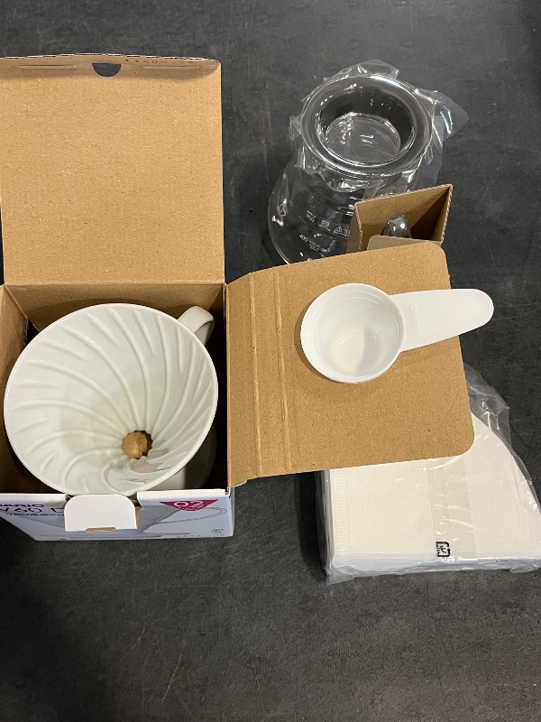Photo 1 of Hario V60 Coffee Pour Over Kit Bundle Set - Comes with Ceramic Dripper, Range Server Glass Pot, Measuring Spoon, and 100 Count Package of Hario 02W Coffee Filters
