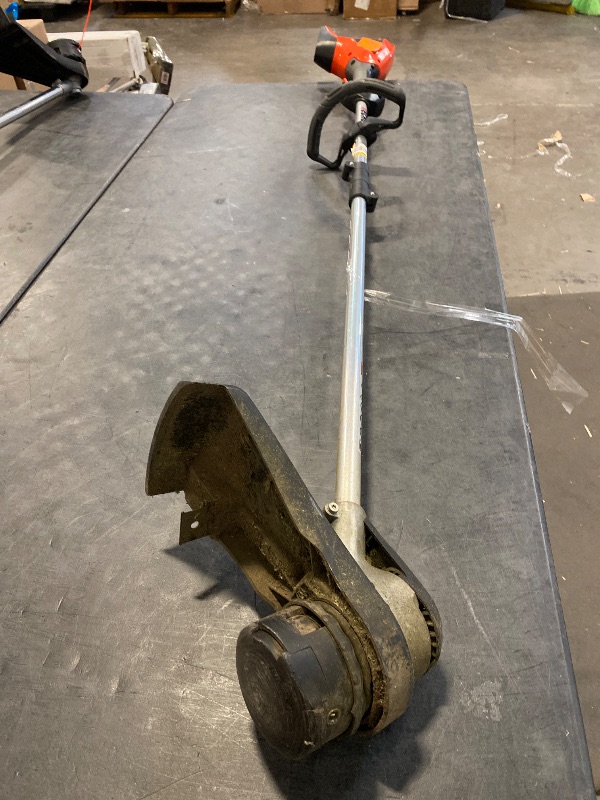 Photo 1 of 56V 16 in. Brushless Cordless Battery Straight Shaft String Trimmer with Speed-Feed Head and 2. 5Ah Battery and Charger
