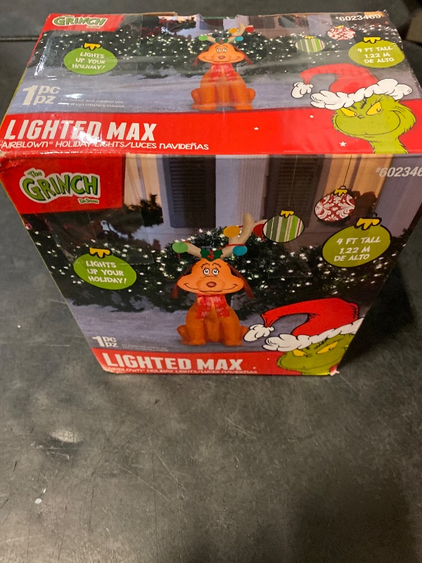 Photo 1 of Grinch 4-ft Lighted Dr. Seuss Merry Christmas Inflatable