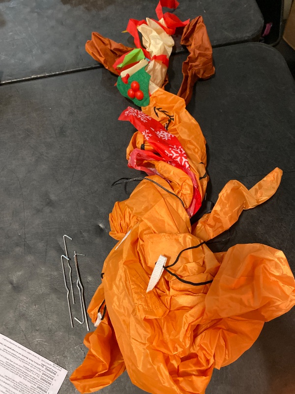 Photo 1 of Grinch 4-ft Lighted Dr. Seuss Merry Christmas Inflatable