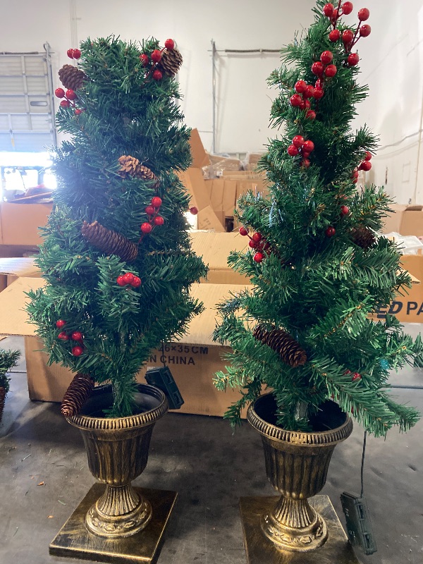 Photo 1 of Juegoal 3 FT Christmas Tree, Upgrade Pre-Lit Crestwood Spruce Entrance Tree with 100 LEDs Lights, Pine Cones, Red Berries in Gold Urn Base for Front Door, Porch, Entryway Xmas Home Decorations, 2 Pack