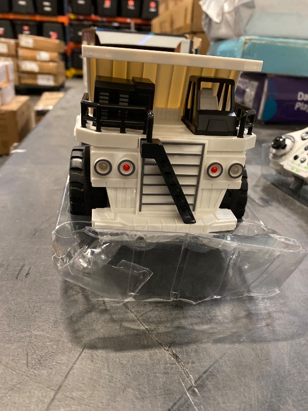Photo 1 of Remote Control Dump Truck, 11CH RC Dump Truck for &, 1:24 Scale RC Construction Vehicle Toy with Lights & Sounds, 1 Batteries, Christmas Birthday Gift for Teens 3-12, White
