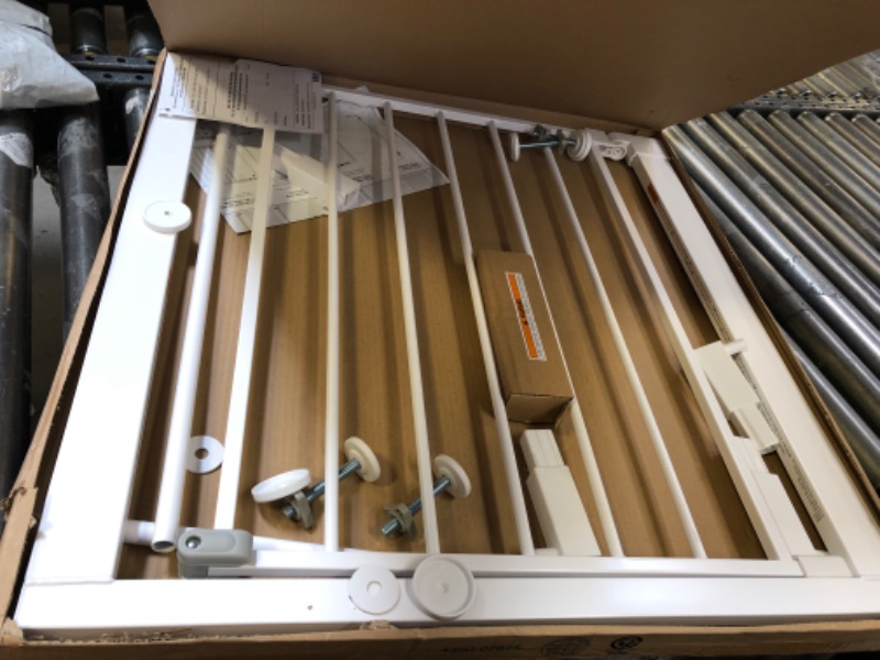 Photo 1 of Safety 1st Easy Install Walk Thru Baby Gate for Doorways, Gate With Door, Dog Gates, Fits 29"-38", Easy Install 28" Tall, White