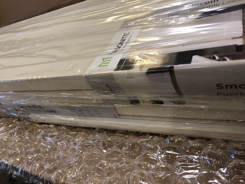 Photo 1 of 2sets  30 in. x 80 in. 2 Panel Lincoln Park Primed White Hollow-Core Composite Bi-fold Interior Door
