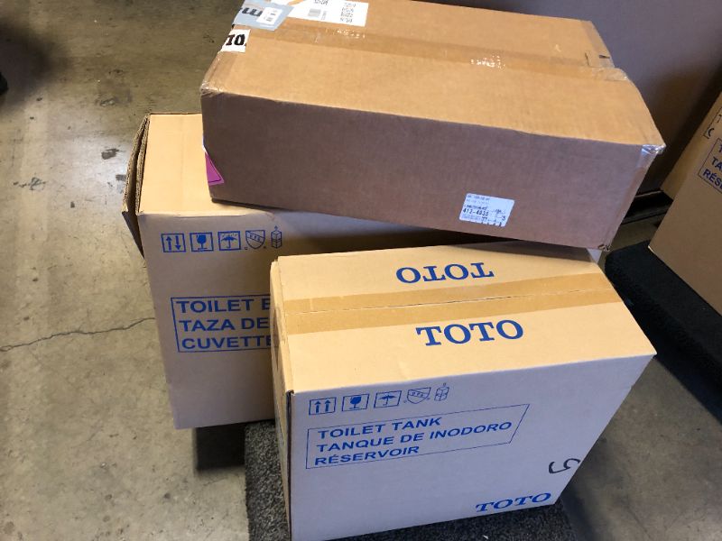 Photo 1 of TOTO Drake Elongated Universal Height TORNADO FLUSH Toilet Bowl with Tank and Lid
