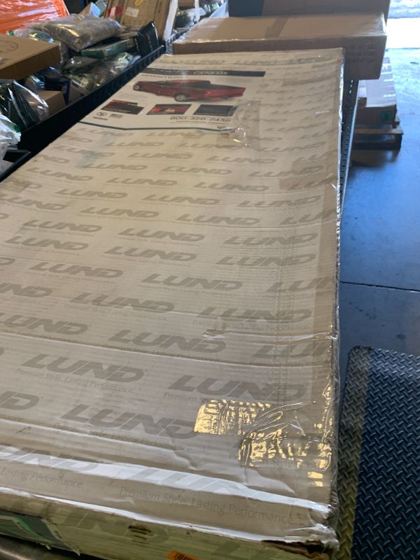 Photo 1 of Lund Genesis Tri-Fold Soft Folding Truck Bed Tonneau Cover | 95092 | Fits 2007 - 2013 Chevy/GMC Silverado/Sierra 5' 9" Bed (69.3")