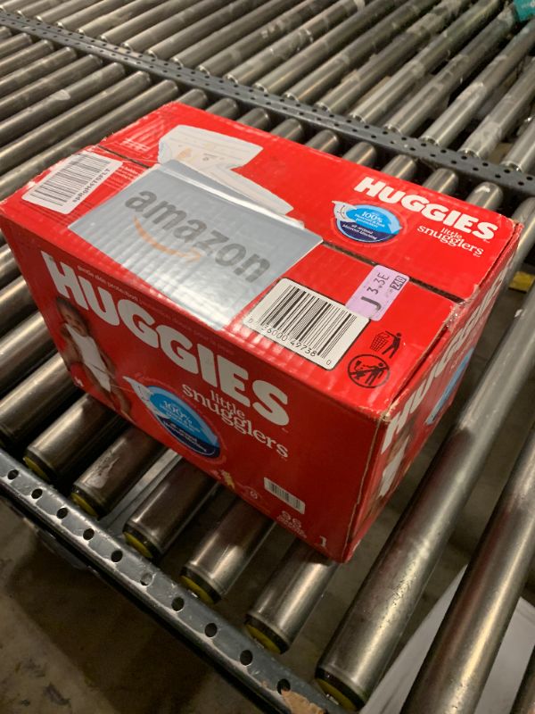 Photo 1 of Huggies Size 1 Diapers, Little Snugglers Baby Diapers, Size 1 (8-14 lbs), 96 Count, Packaging May Vary